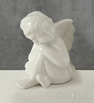 Статуэтка ангел сидячий — качественная статуэтка из керамики белоснежного цвета.. . фото 1