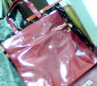 абсолютно новая сумочка лёгкая  удобная без изъянов( просто не мой стиль) размер. . фото 2