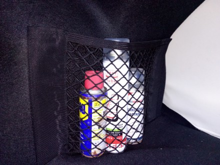 Універсальна сітка органайзер (кишеня) у багажник або салон на липучках.

Розм. . фото 4