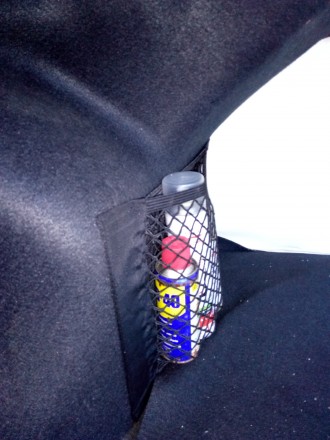 Універсальна сітка органайзер (кишеня) у багажник або салон на липучках.

Розм. . фото 5