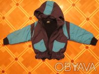 Продам на мальчика зимнюю куртку темно-синюю с голубыми вставками фирмы «N. . фото 4