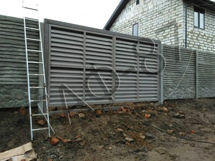 При любом строительстве важно, чтобы гаражные ворота производились в соответстви. . фото 8