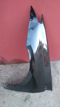 крило ліве переднє вживане оргинальне пошкоджене(пошкодження незначне)чорний кол. . фото 2